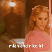 a woman in a pink dress with the words " miah and nico irl " above her
