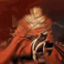 a blurred image of a spawn character with a red cape
