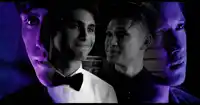 two men are standing next to each other with purple smoke coming out of their heads