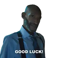 a man in a blue shirt and suspenders says " good luck "