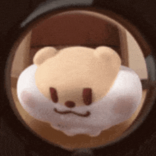 a close up of a stuffed animal in a circle