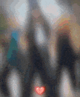 a broken heart is visible in the middle of a blurry picture