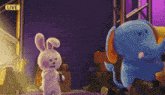 a rabbit and an elephant are standing next to each other with a live sign above them