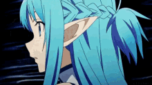 a close up of a girl with blue hair and ears .