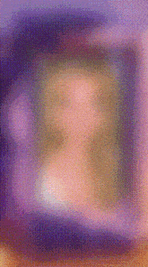 a blurred image of a person 's face in a frame with a purple and orange background .