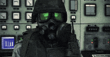 a soldier wearing a gas mask is sitting in front of a panel that says local