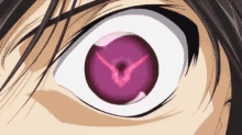a close up of a person 's eye with a purple eye and a purple symbol in it .