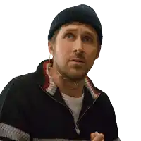 a man wearing a beanie and a sweater has a pair of ear plugs around his neck