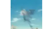 a blurred image of a person flying through the air .