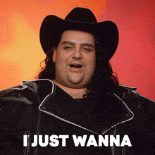 a man with long hair wearing a cowboy hat and a leather jacket says i just wanna