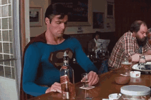 Superman Drinking Whiskey - Superman GIF - Superman Whiskey Clark Kent GIFs