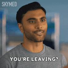 a man says " you 're leaving " in front of a skymed ad