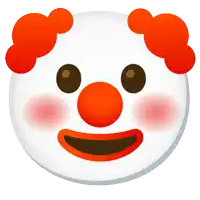 a clown smiley face with red hair and a big smile