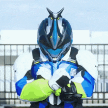 a person wearing a helmet and a jacket that says sumo