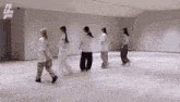 a group of girls are dancing in a room with the words i 'll like you on the wall