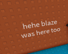 the word blaze that is on a brown surface