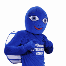 a blue mascot is wearing a shirt that says ' vorumaa ' on it