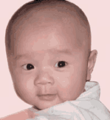 Baby Wink GIF - Baby Wink Blinking GIFs