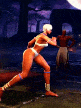 a woman in a bikini is dancing in a video game with a man standing behind her