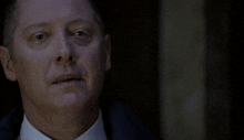 a man in a suit and tie with the words " lrd before you accuse anyboss " on the bottom