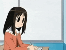 a cartoon girl is sitting at a desk with a pen