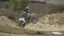 riding dirt rider stunt in the air slow mo