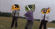 a group of men standing in a field with gifmemes.io in the corner