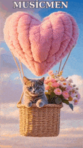 a cat is sitting in a basket with flowers in a hot air balloon shaped like a heart