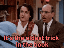 two men standing next to each other with the words it 's the oldest trick in the book
