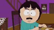 randy from south park is sitting at a table eating food
