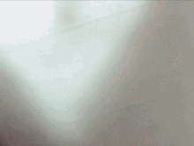 a close up of a red and white background