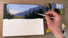 a person is painting a landscape with the words made in animatica visible