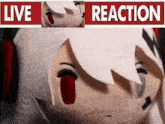 a stuffed animal with a red tongue and the words live reaction behind it