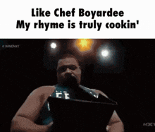 a gif of a man reading a book with the words like chef boyardee my rhyme is truly cookin '