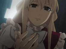 a close up of a blonde anime character with a red collar