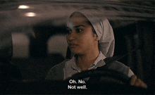 a woman in a head scarf is driving a car and saying oh no not well