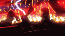 a group of people are standing in front of a fire with a lightning bolt in the background .