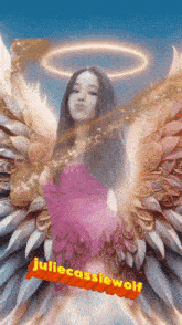 a girl with angel wings and the name juliecassiewolf