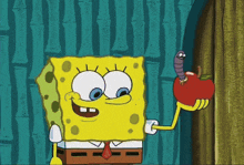 a cartoon character named spongebob is holding an apple with a worm in it