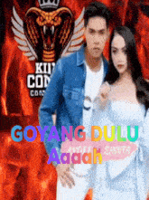a man and a woman standing next to each other with the words goyang dulu aaah on the bottom