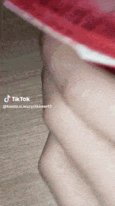 a close up of a person 's leg with a tiktok watermark on the bottom
