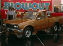 Datsun Datsun Dealer Blowout GIF - Datsun Datsun Dealer Blowout Trucks GIFs