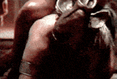 a close up of a person 's shoulder with a bracelet around it