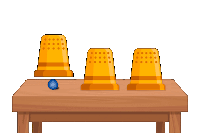 three yellow cups are on a wooden table with a blue ball in the middle
