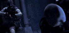 a car with the headlights on is driving past a person in the dark