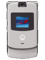 a silver motorola flip phone with a screen showing a beach scene