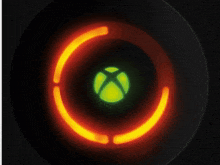 a glowing circle with a green x in the center