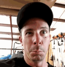 Guy With Cap Making Funny Faces GIF