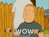 a cartoon character from king of the hill is riding a bike with the word wow on it .