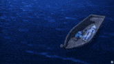 two people laying in a boat in the water with the letter e in the corner